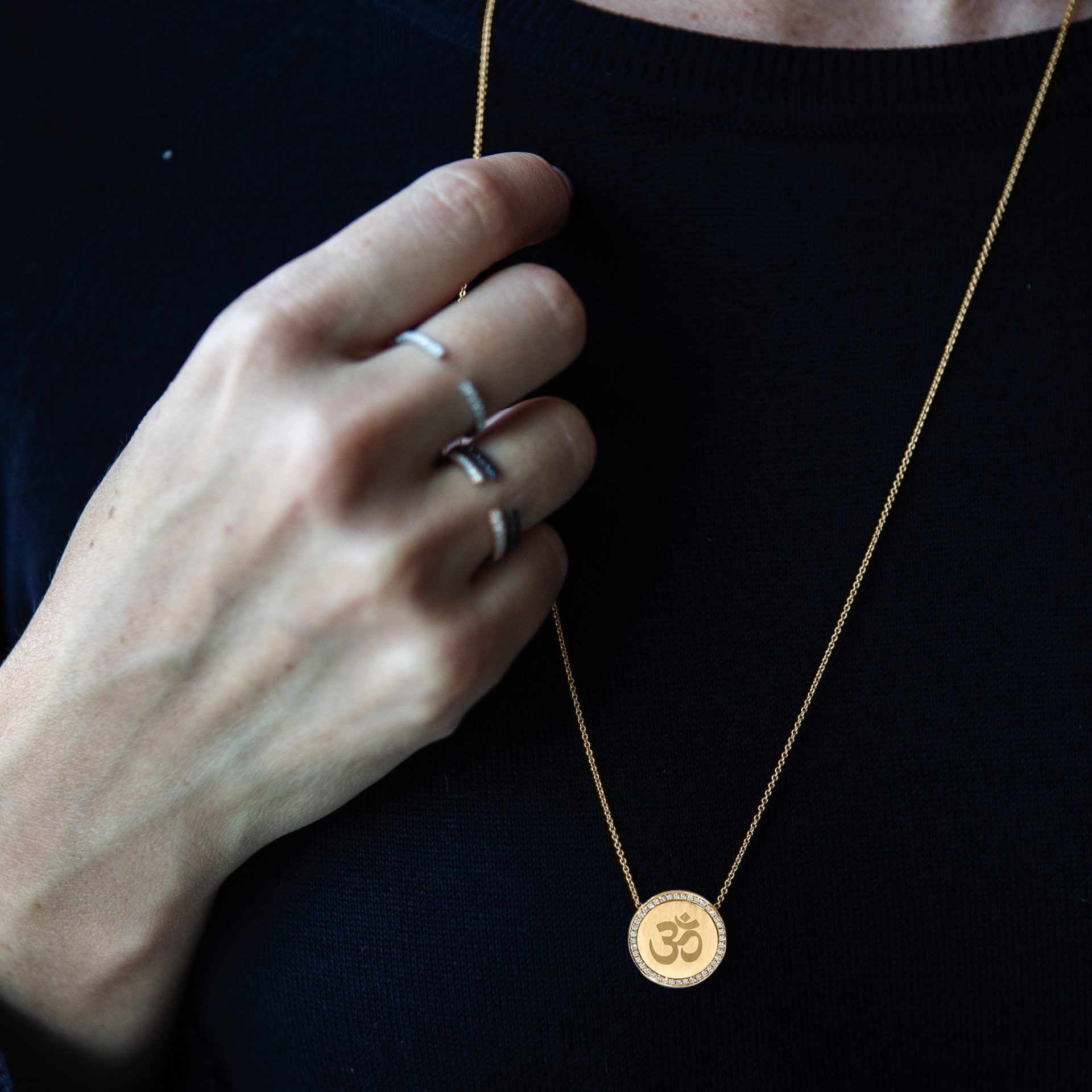 Engraved Om necklace surrounded with diamonds Engraved Om necklace surrounded with diamonds